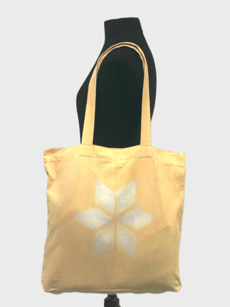 Tote bag plegable de algodón orgánico teñida con tinte natural